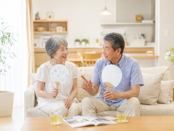 夏を振り返って話し合う夫婦のイメージ画像